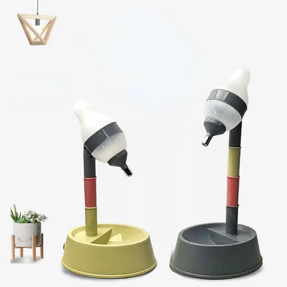 Adjustable height all-in-one pet waterer and feeder for cats and dogs, shown in grey or pink