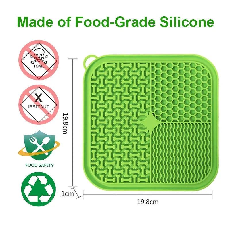 Orange, grey, blue, and green silicone dog licking mat with textured surface and suction cups