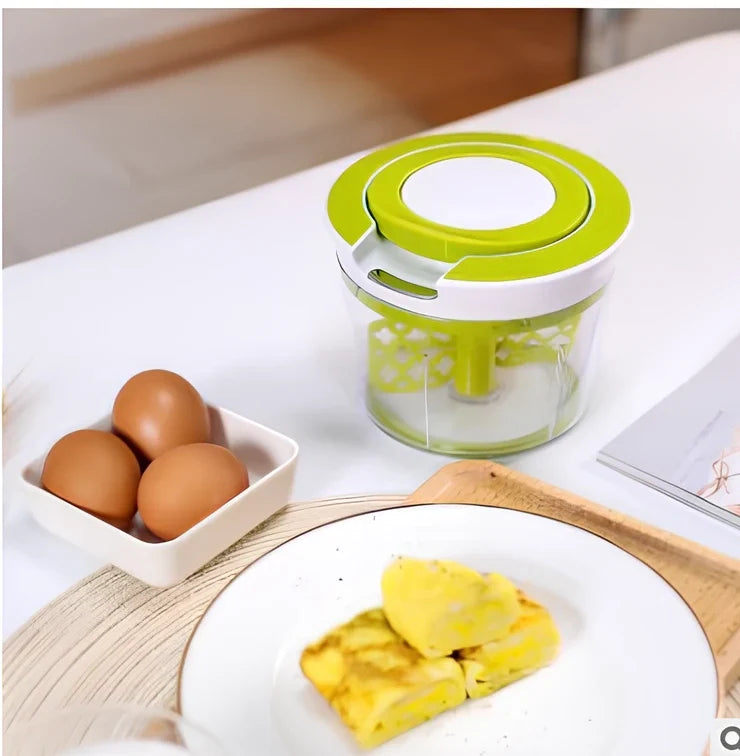 Manual vegetable chopper with three stainless steel blades and 1.2-litre plastic bowl for food preparation