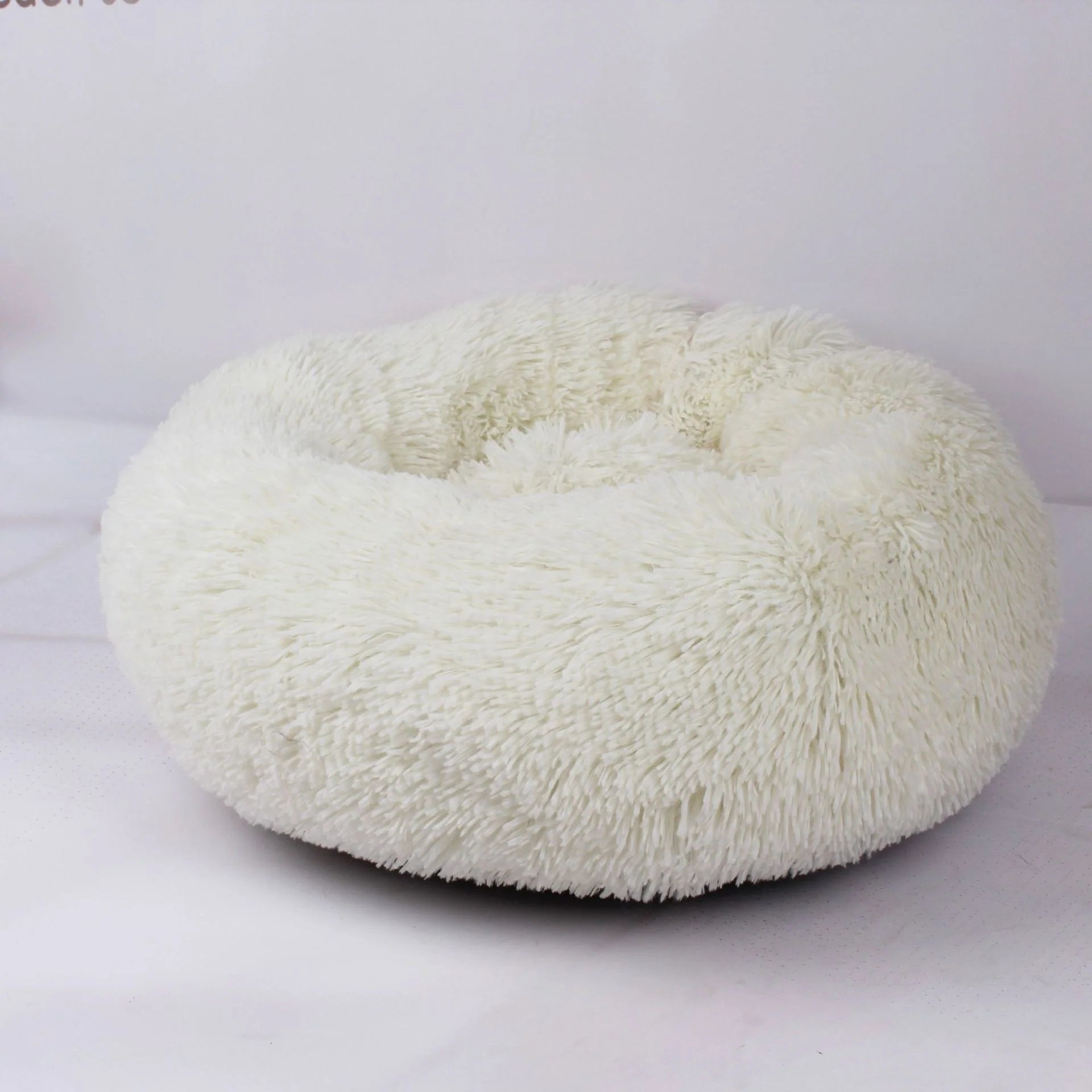 Cozy plush pet nest in various colors and sizes for ultimate pet comfort
