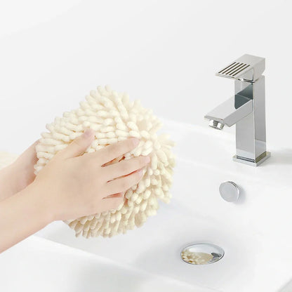 Beige chenille hanging hand towel with integrated loop for quick drying