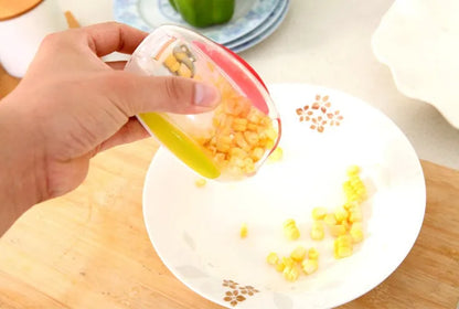 Kitchen corn separator tool with stainless steel blade and plastic case for removing kernels from corncobs