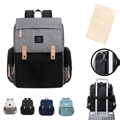 LAND Mommy large grey diaper backpack with changing mat, shown as a travel nappy bag.