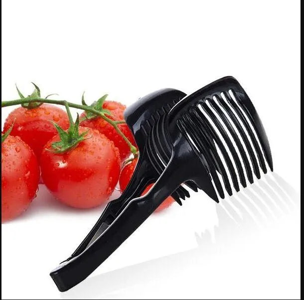 Plastic fruit and vegetable cutting holder slicer in black or green, measuring 18.5cm by 8cm