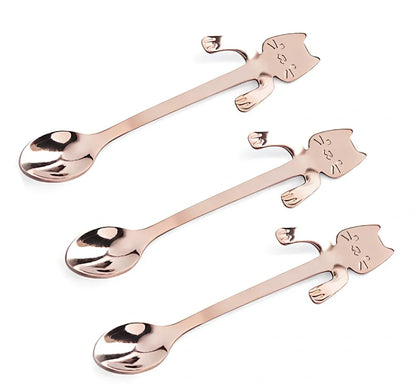 Stainless steel coffee spoon with cartoon cat handle design showing 11.7cm measurement scale