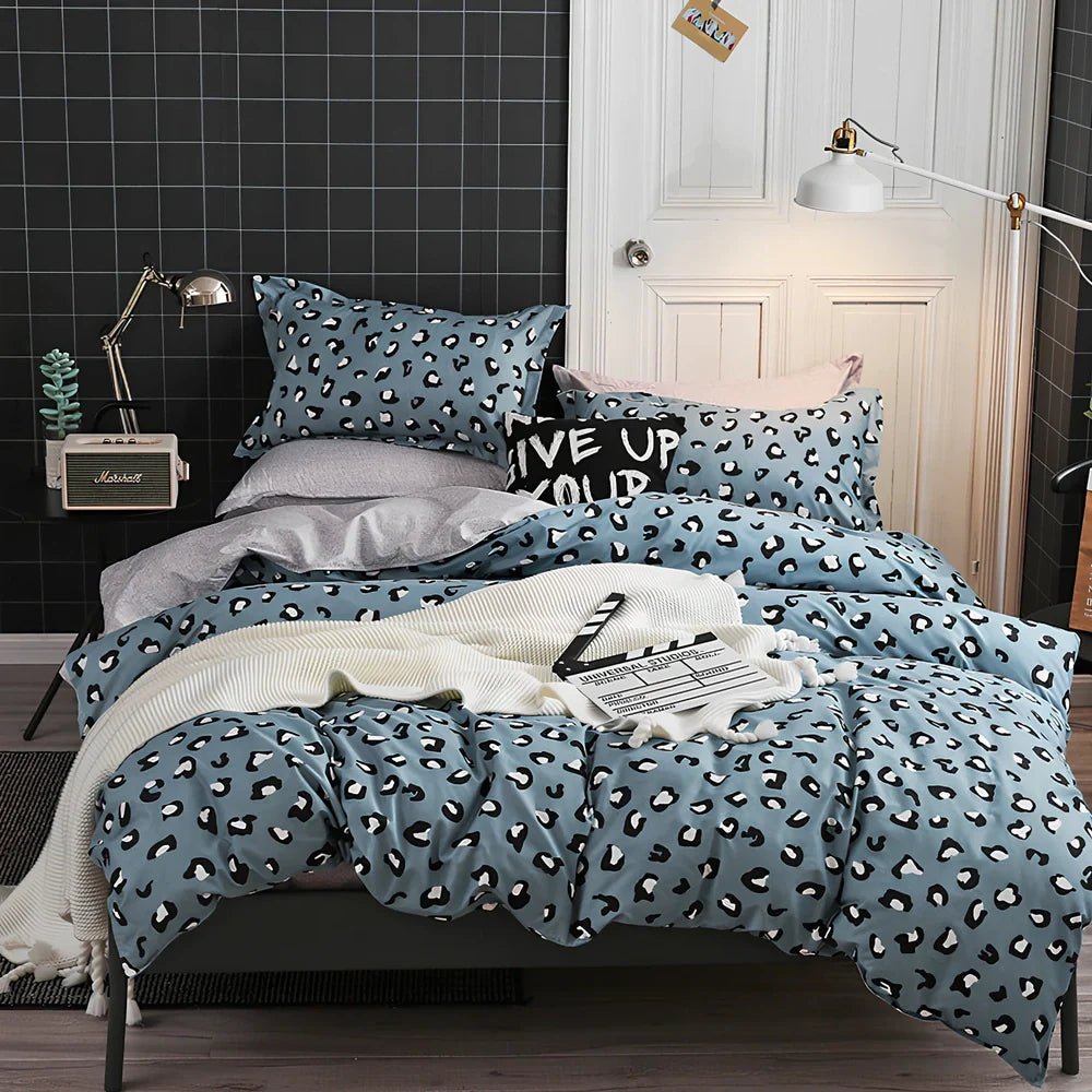 Pink polyester bedding set with twill weave duvet cover, pillowcases, and deep pocket fitted sheet in UK sizes