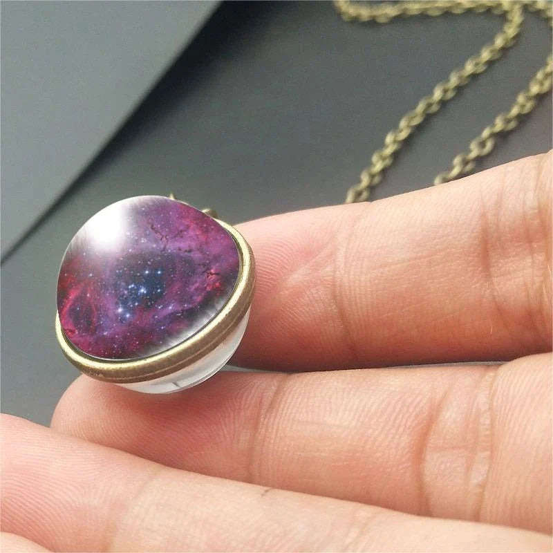 Mesmerizing double-sided galaxy pendant necklace in various celestial patterns and colors