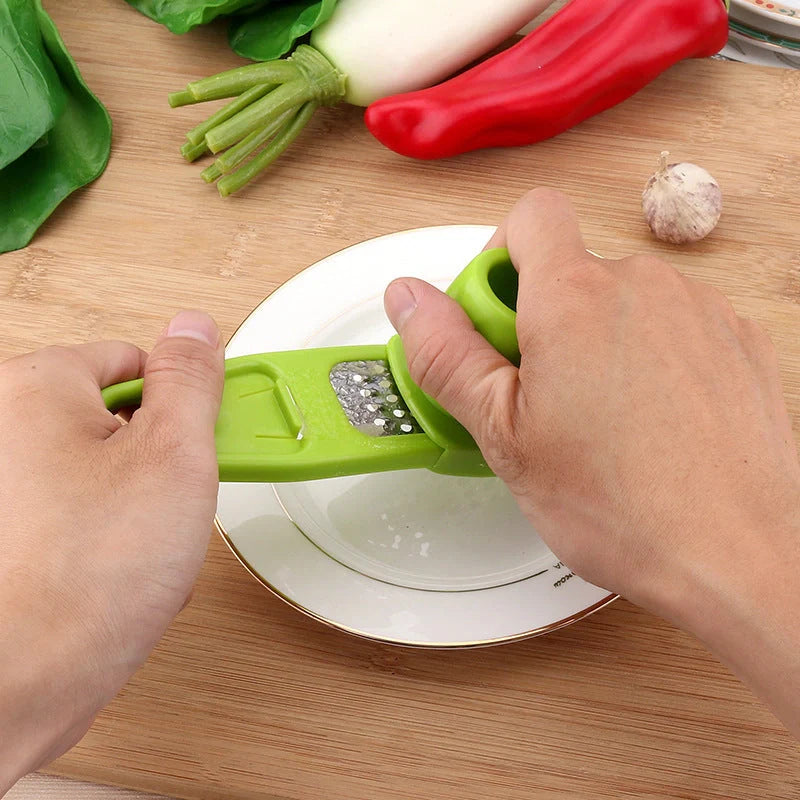 Garlic masher and seasoning grinder in rose red and light green, eco-friendly materials