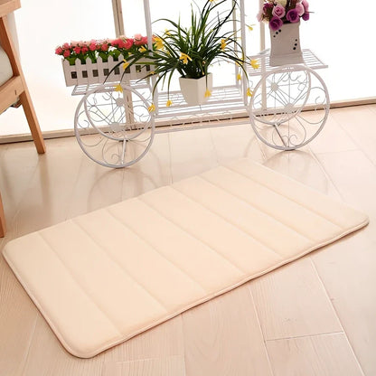 Memory foam bathroom carpet with coral fleece surface and non-slip latex backing in beige colour