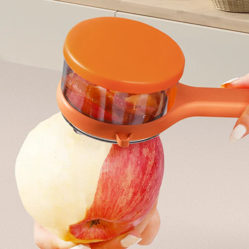 Light green kitchen peeler with an integrated storage bucket for collecting fruit and vegetable peel.