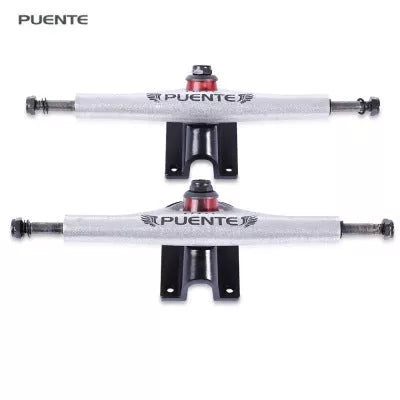 Puente skateboard bracket in black and white, alloy construction for durability