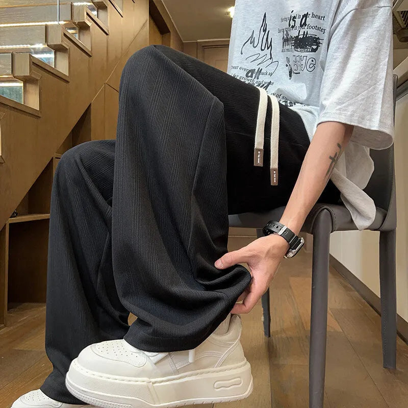 Men's summer loose straight polyester casual trousers in white, black, khaki, or apricot, sizes M to 5XL