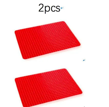 Red silicone pyramid grid cooking mat on a kitchen counter