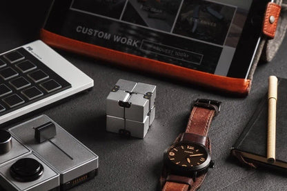 Infinity Cube decompression toy in zinc alloy with 360-degree rotation capability