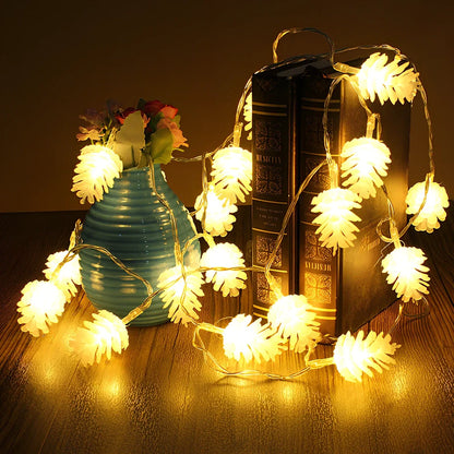 LED pine cone decorative light string with warm white illumination and battery operation