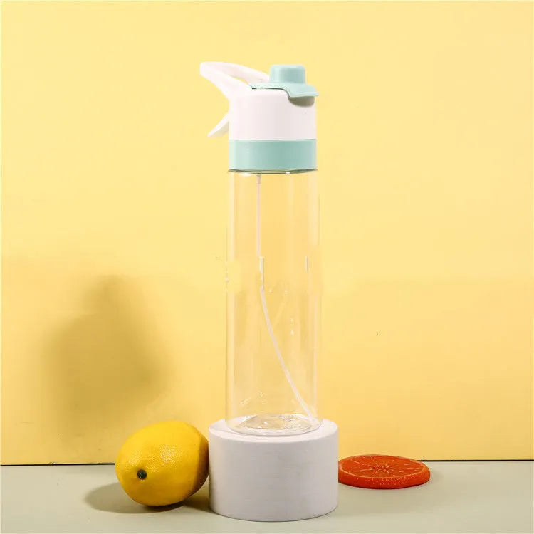 Large plastic spray water bottle with handle strap and leakproof lid in green colour.