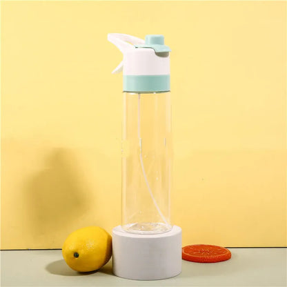 Large plastic spray water bottle with handle strap and leakproof lid in green colour.