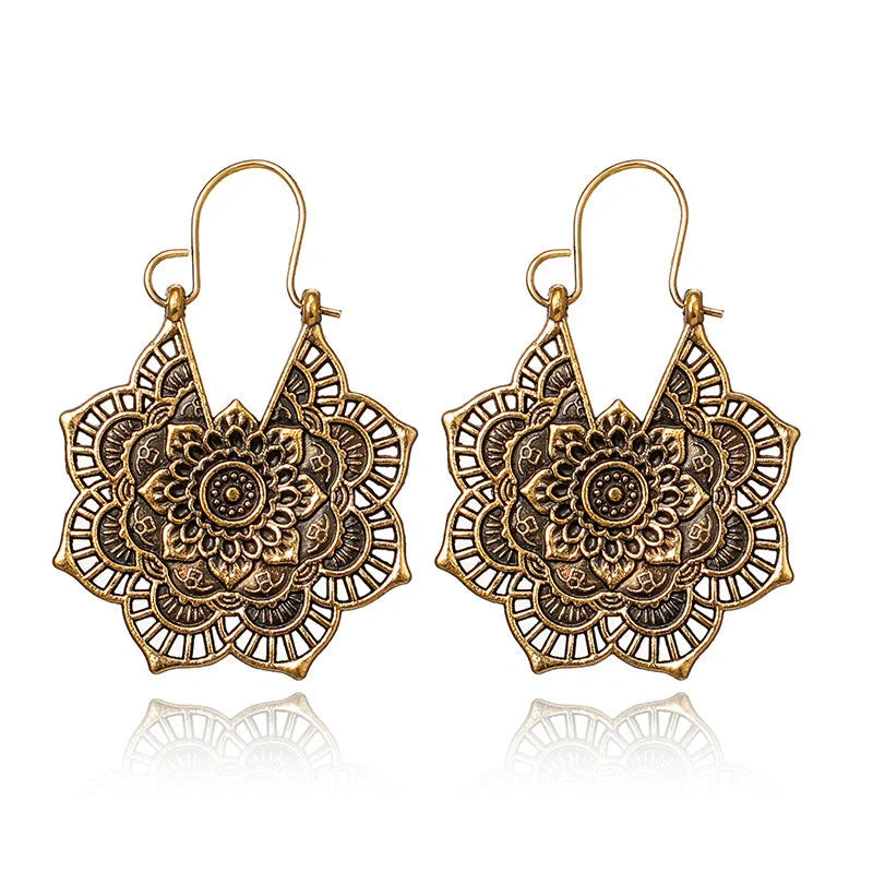 Vintage floral openwork metal earrings showcasing ethnic style and elegance