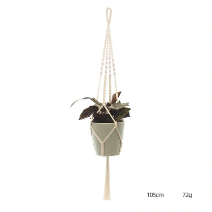 Hand-knitted cotton flowerpot net bag showing mesh pattern and hanging installation