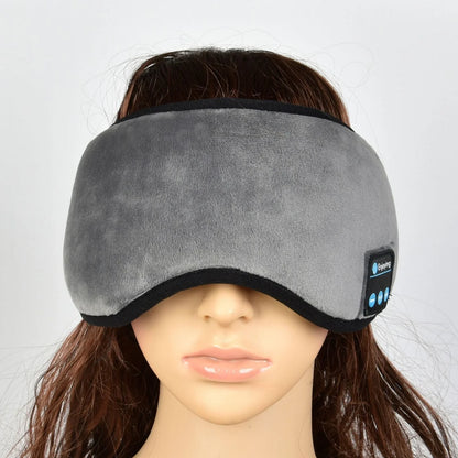 Black contoured eye mask with adjustable straps showing measurements of 20cm width and 10cm height