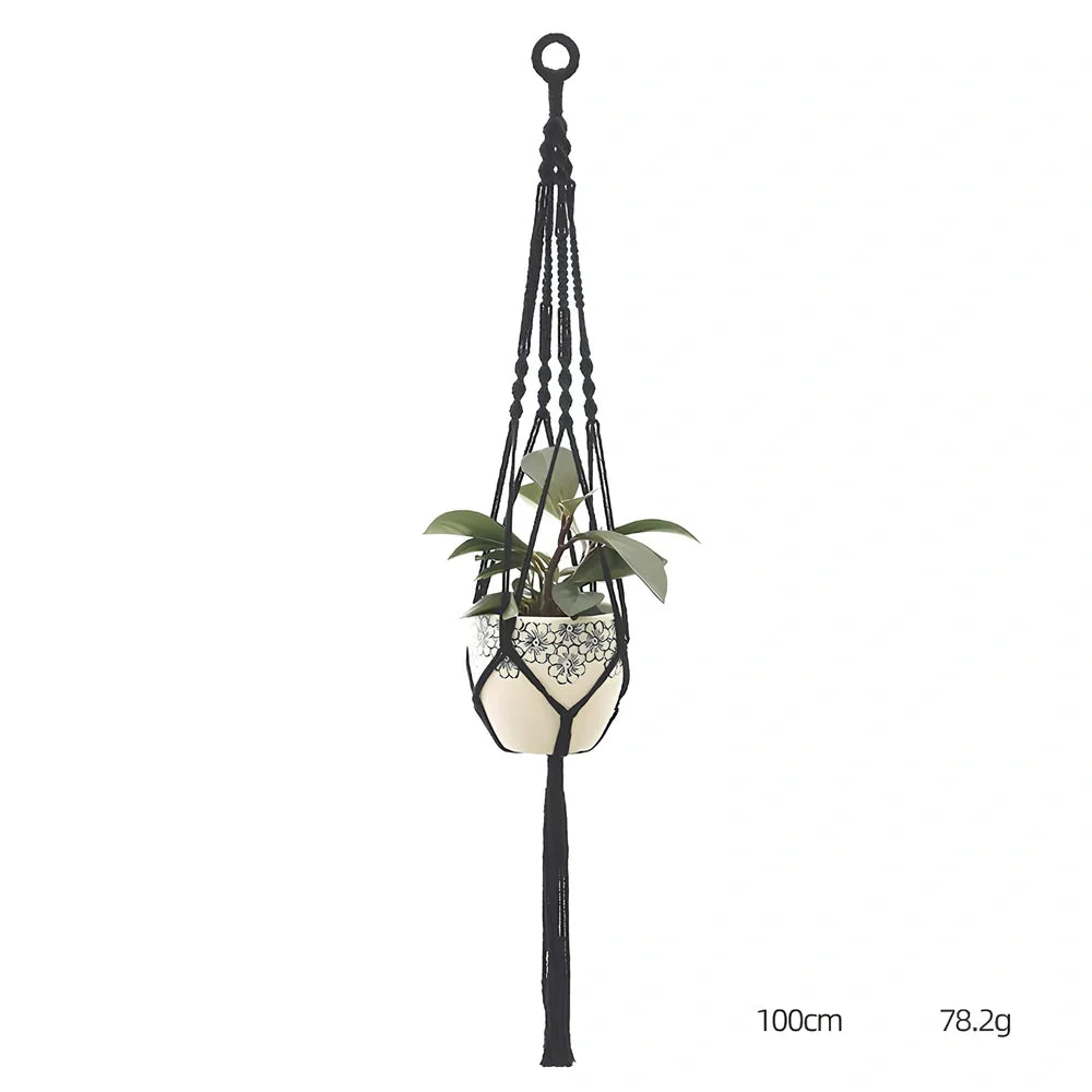 Hand-knitted cotton flowerpot net bag showing mesh pattern and hanging installation