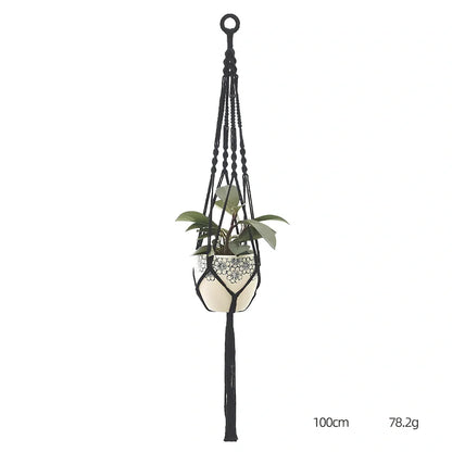 Hand-knitted cotton flowerpot net bag showing mesh pattern and hanging installation