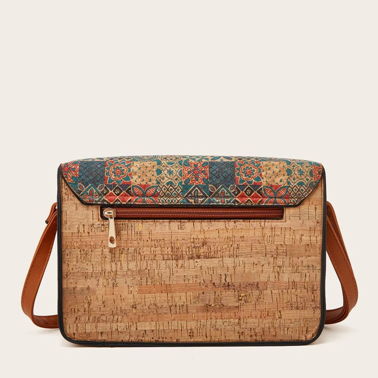 Women's one-shoulder crossbody bag with printed design in green colour, showing large capacity and single strap.
