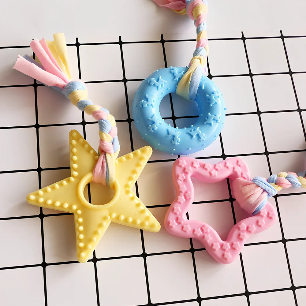 Non-toxic rubber dog chew toys in star, ring and ball shapes with textured cleaning surface