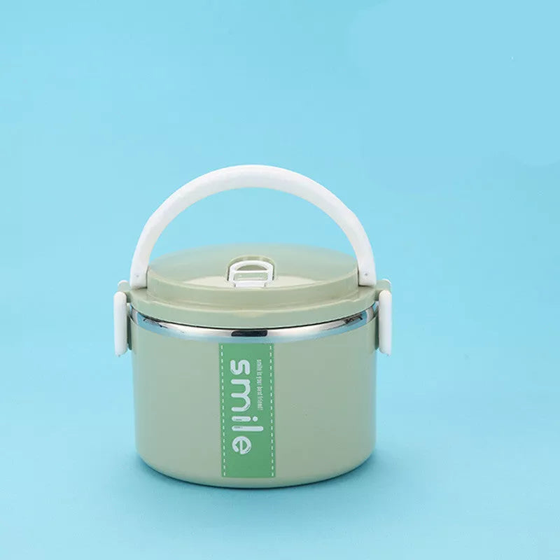Stainless steel lunch box with built-in spoon, leak-proof design, available in green, pink, and blue
