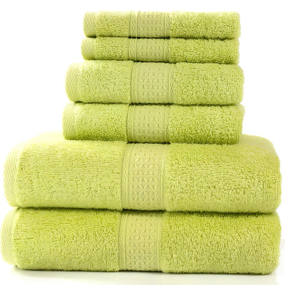Cotton towel set showing bath towel, hand towel, and face cloth in coordinated sizes
