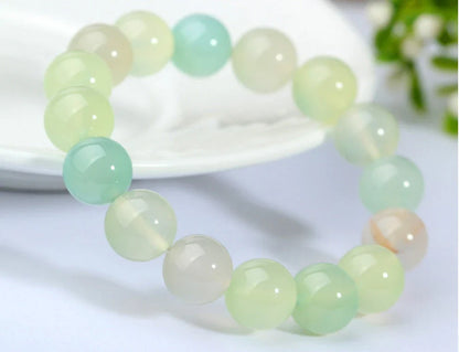 Handcrafted black lava beaded bracelet with seven chakra stones for healing and balance