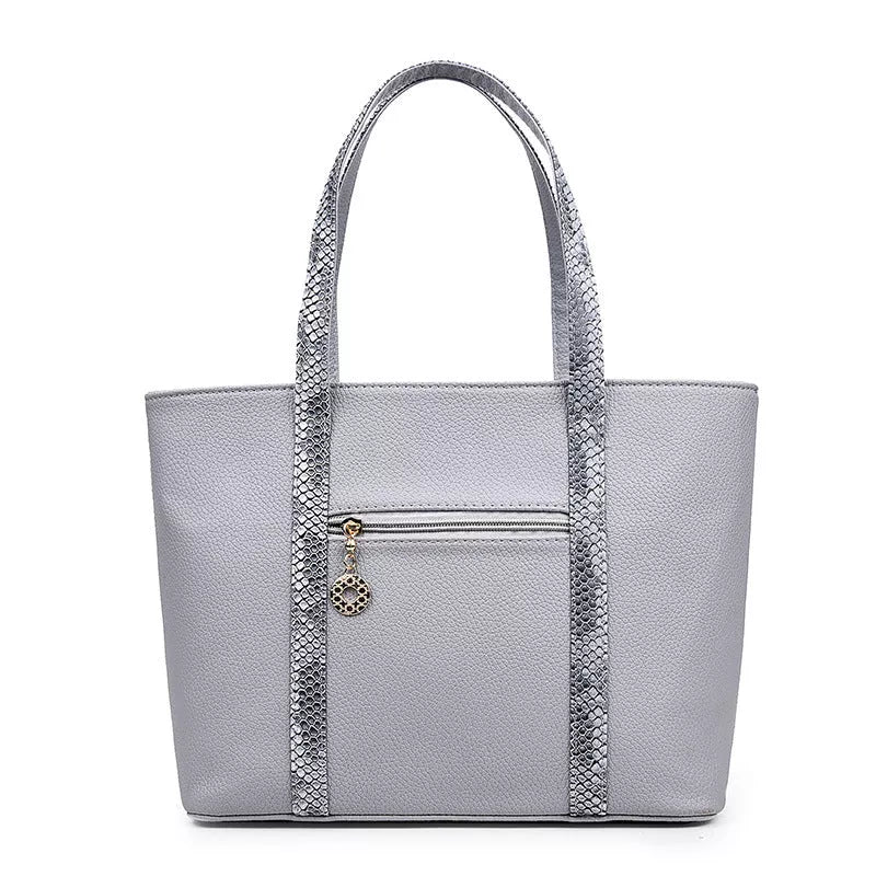 Women's stylish shoulder bag with zipper closure and multiple pockets in light gray, black, off-white, and rose red.