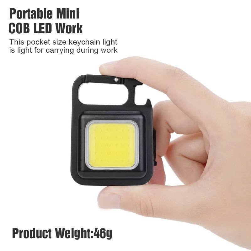Black aluminium alloy USB rechargeable keychain light with magnetic base and foldable handle