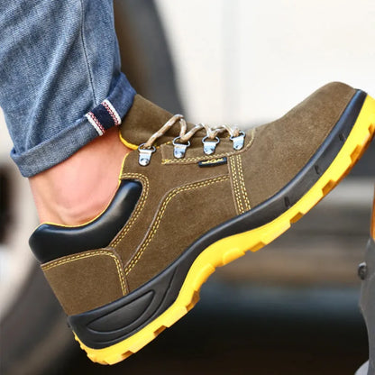 Bronze low-cut leather safety shoes with steel toe cap and patterned non-slip rubber sole.