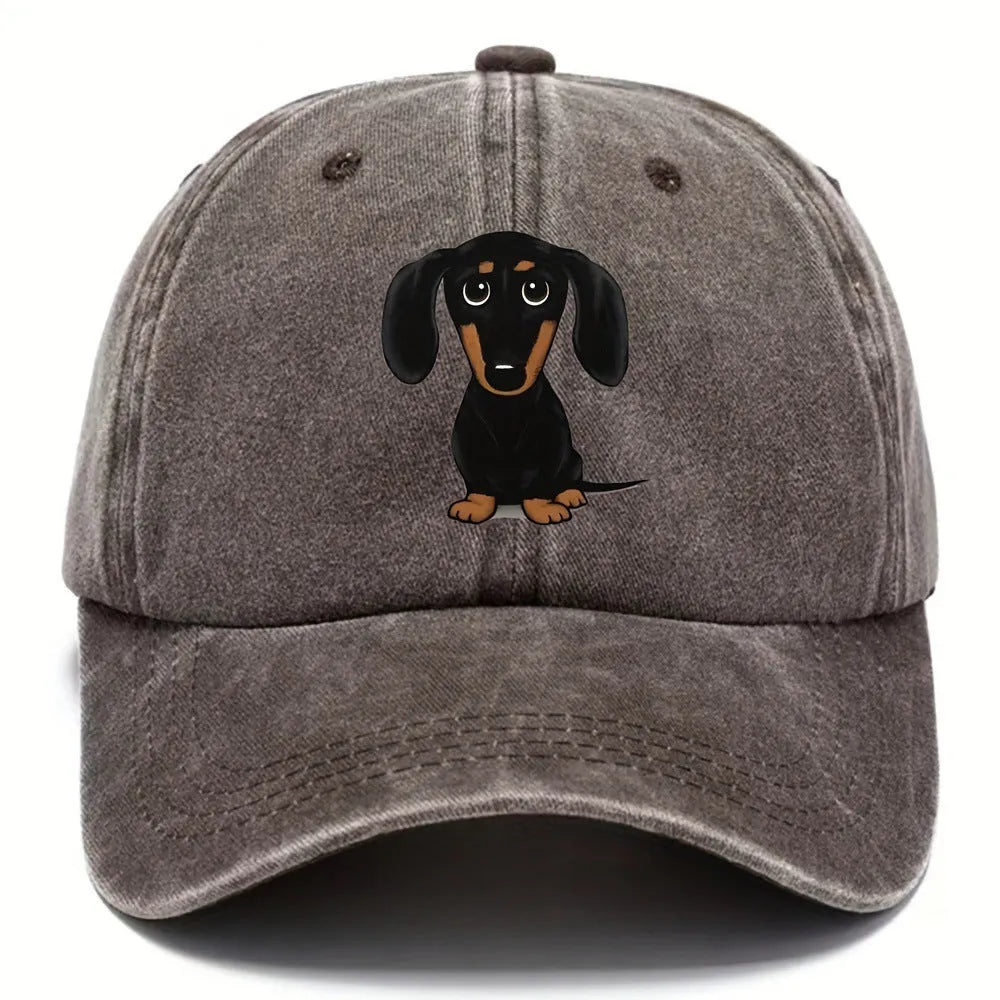 Retro washed cotton baseball cap with Dachshund embroidery, dome crown, and adjustable size tab.