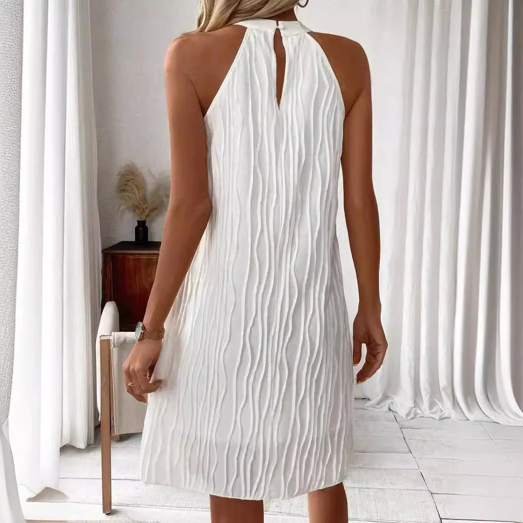 Women's white halter backless dress with umbrella skirt, perfect for any occasion