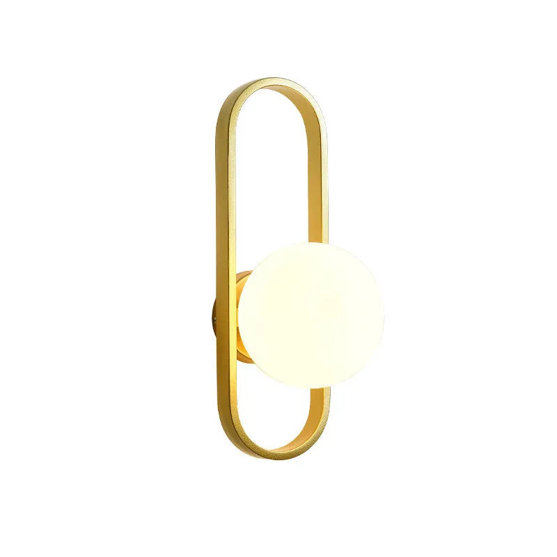 Minimalist wall lamp in black or gold finish with glass shade and 12W tri-colour LED lighting