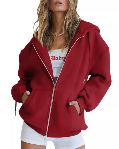 Women's solid color zipper hooded sweatshirt with drawstring, available in multiple colors and sizes.