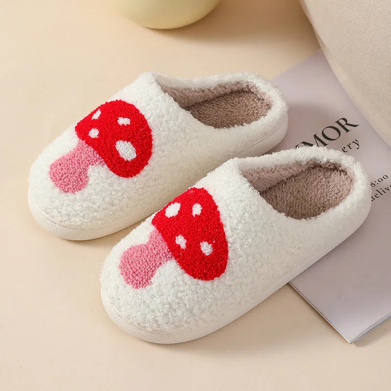 Women's plush home slippers in cartoon designs with a non-slip PVC sole.