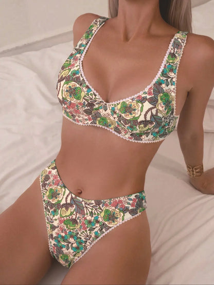 Women's floral print bikini with high waist briefs and adjustable ties.