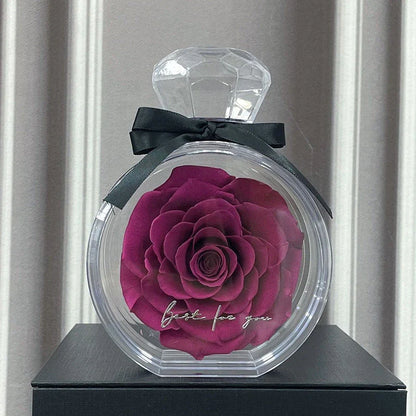 Preserved floral ornaments in various colors, displayed in a transparent cover for elegant home decor