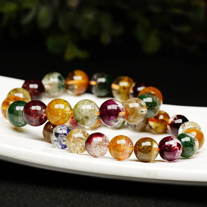 Colourful ghost cornucopia design bracelet made with 10mm crystal beads in a retro ethnic ball bracelet style.