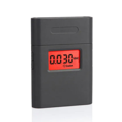 Black At-838 digital alcohol breathalyser on a plain background.