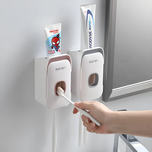 Blue automatic toothpaste dispenser mounted on a bathroom wall.