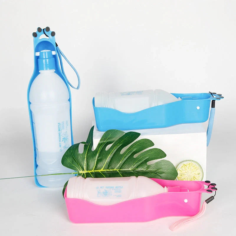 Portable Pet Cup Drinker in pink with 600ML capacity, featuring one-hand operation for easy use.