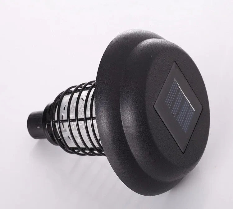 Black solar LED anti-mosquito lamp with UV bug zapper, metal grill and solar panel for outdoor garden use