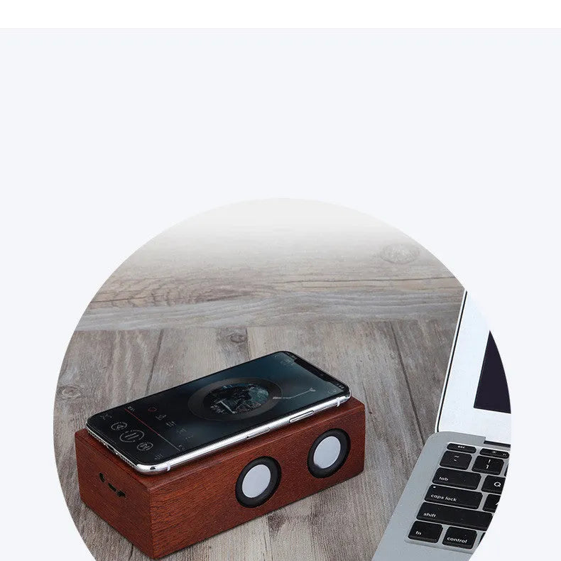 Retro-style wooden Bluetooth speaker in a choice of bamboo, black walnut, or sapele wood finishes.