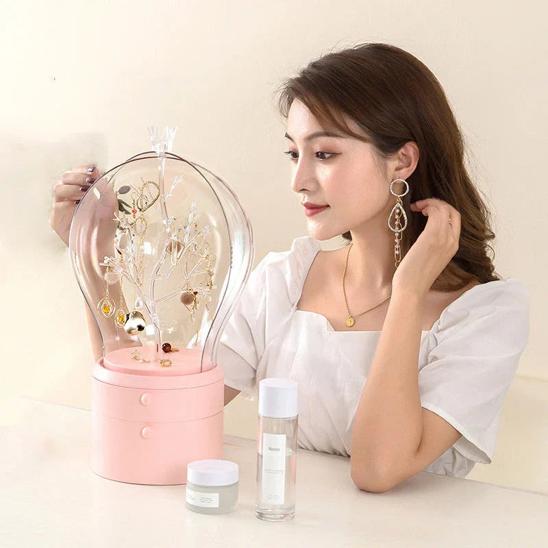 Rotating jewelry organizer with LED lights and USB charging for necklaces, earrings, and makeup storage