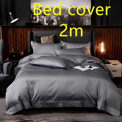 Four-piece quilted cotton bed set in royal blue, showing 200x230 cm cover and 48x74 cm pillowcases for 1.5m bed