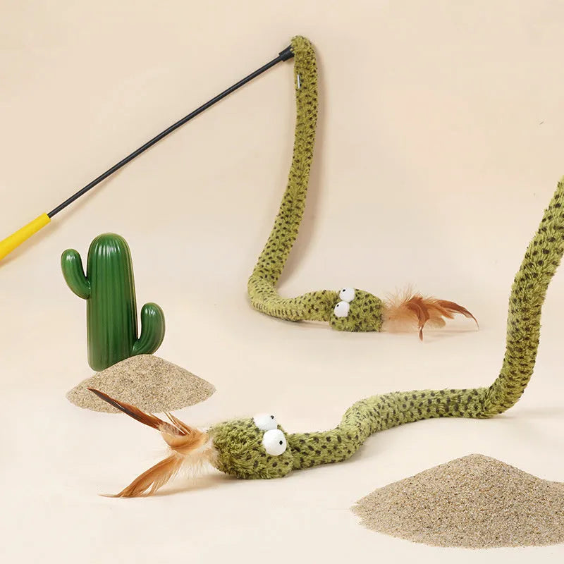 Long green snake cat teasing stick toy with feather end for cat play.
